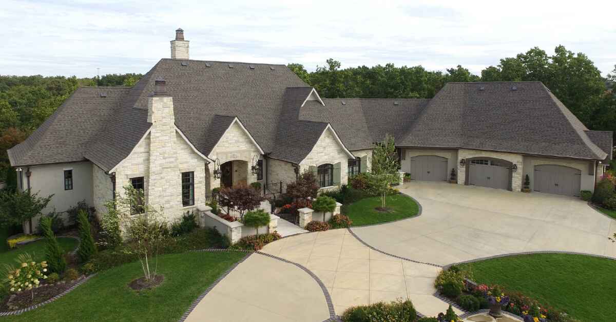 Overlooking a large home with a new roof