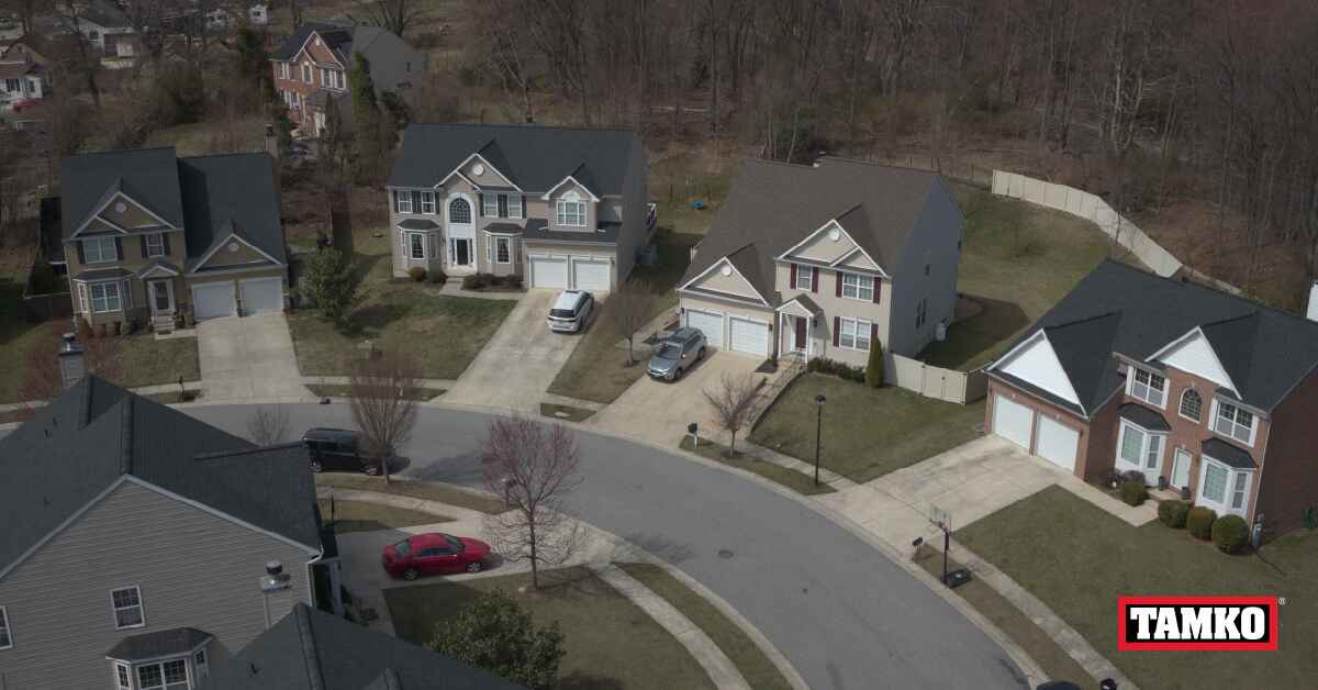 birds eye view of a large home with a new roof