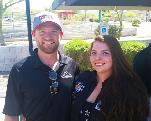 Phoenix-area TAMKO representative with roof recipient Rachel.